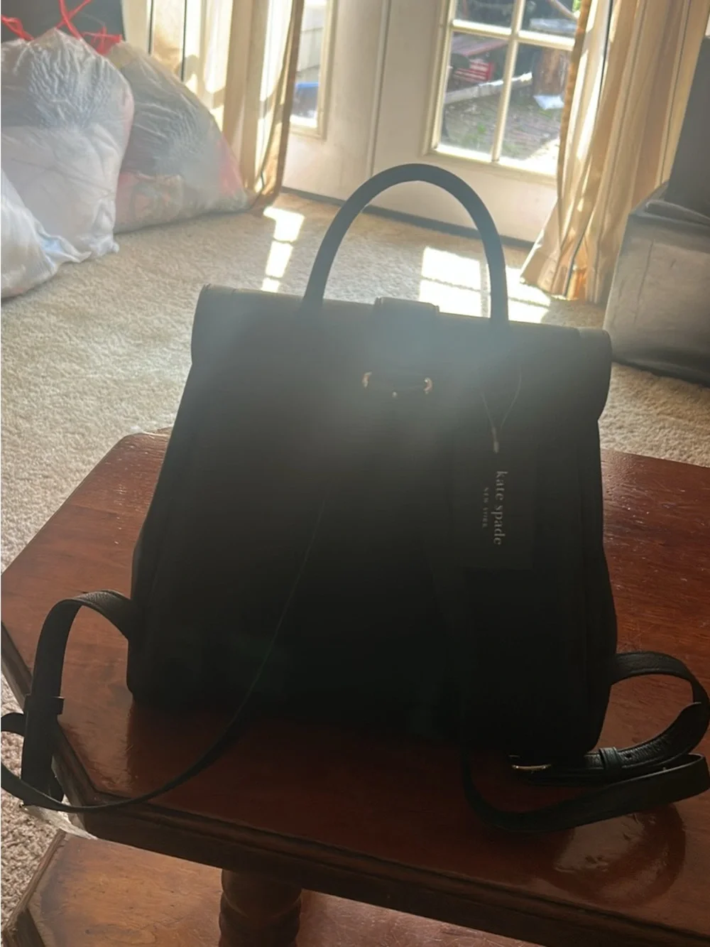 kate spade Black Pebbled Leather Messenger Bag with Gold Plaque